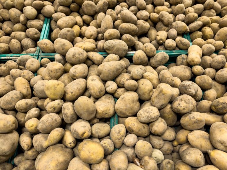 Fresh washed potatoes at a market