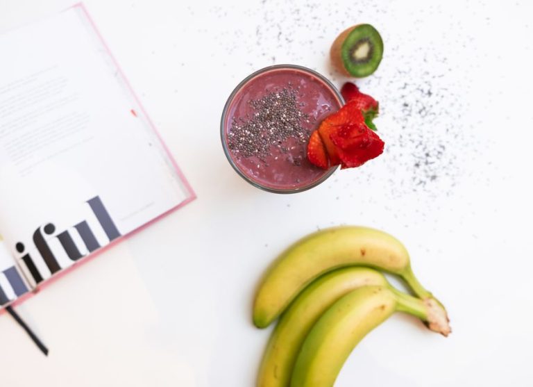 Banana and berry smoothie with fresh fruit
